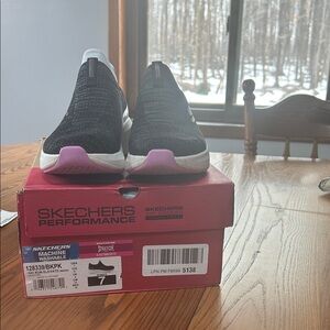 Skechers Black Slip-On Knit Sneakers with Pink Accents